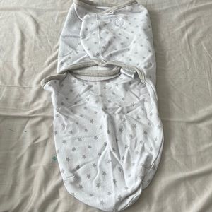 SwaddleMe, infant size SM/MED. Stars print. Velcro swaddler.